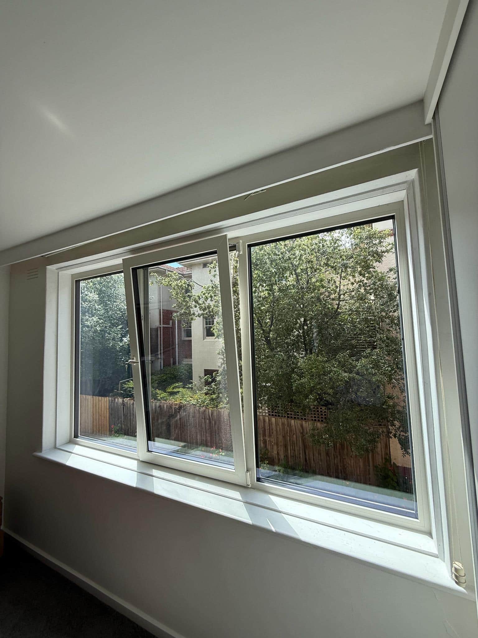 A Windows Republic uPVC double glazed tilt-and-turn window opened in ventilation mode