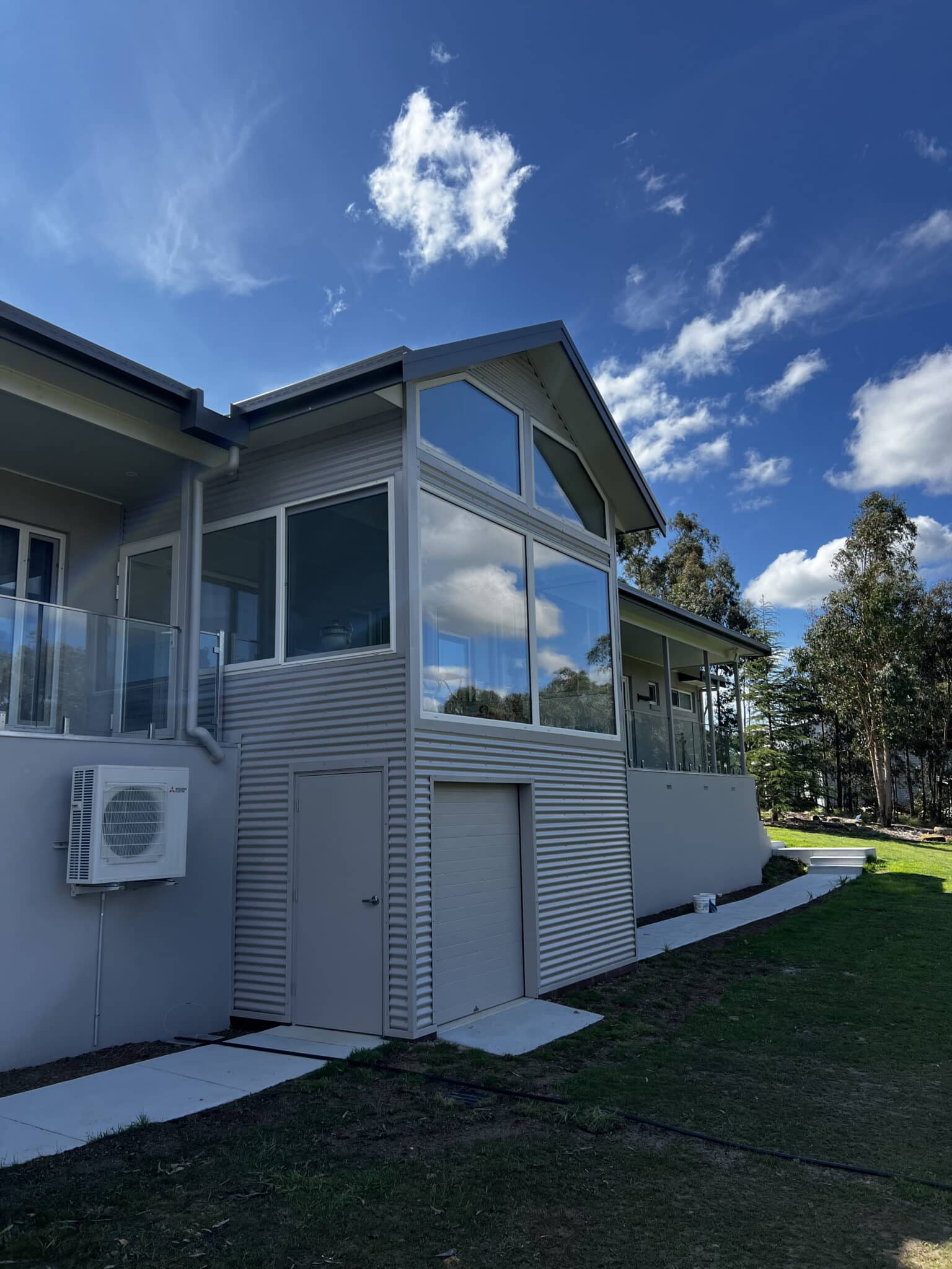 Custom uPVC trapezoid double glazed windows installed in Seville, Melbourne by Windows Republic