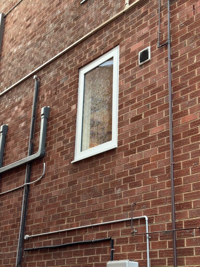 Windows Republic uPVC double glazed casement window installation on Melbourne brick exterior wall