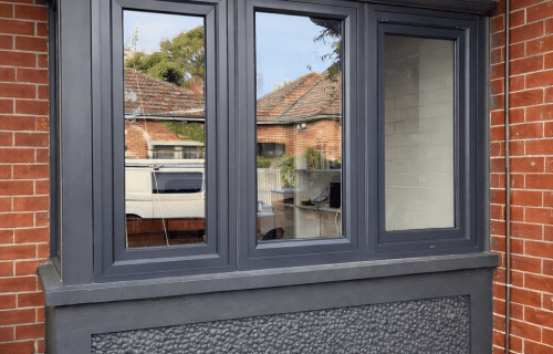 Anthracite grey uPVC double glazed windows installed in heritage brick home in St Kilda Melbourne by Windows Republic
